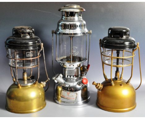 Tilley Lamps - Two vintage 20th Century Tilley paraffin lamps of typical form with each having black enameled covers with&nbs