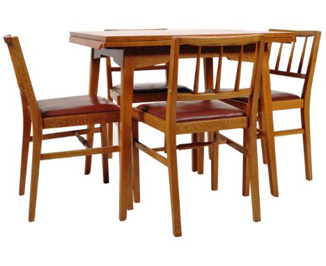 E. Gomme - G Plan - Brandon Range - A retro vintage mid 20th Century golden oak draw leaf table and matching four chairs. The