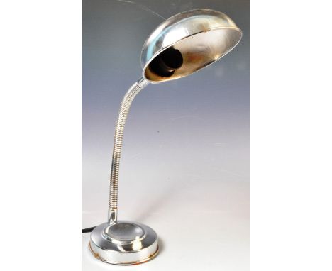 A retro vintage 20th Century French adjustable chrome desk / table lamp light having a domed chrome shade upon a gooseneck ar