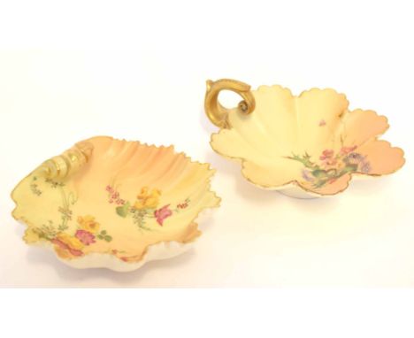 Two Royal Worcester blush ground dishes, one of shell shape, the other with gilt scroll handle, both decorated in typical fas