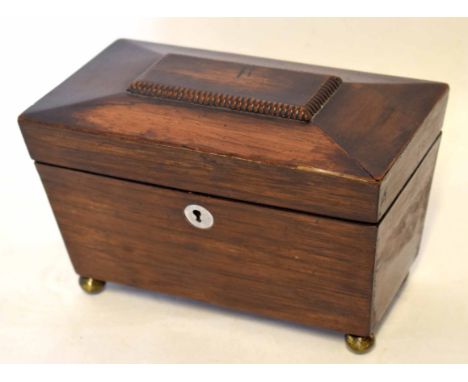 Early 19th century rosewood tea caddy, ogee top over interior fitted with two lidded compartments on four brass ball feet, 20