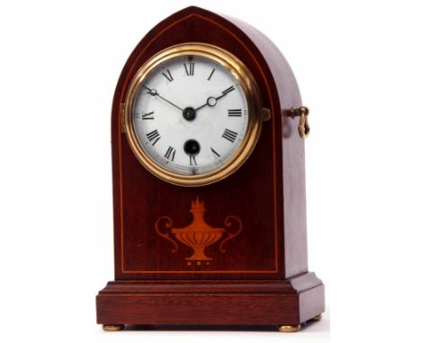 Mahogany and boxwood line inlaid mantel timepiece, the lancet shaped case with side handles on a plinth base with compressed 