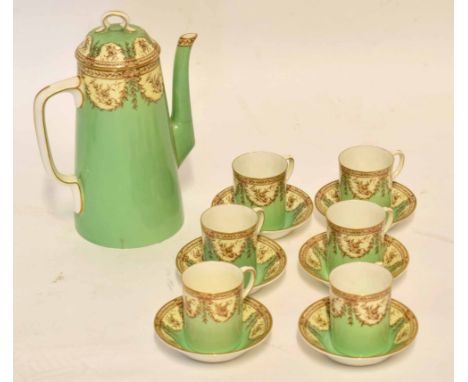 Early 20th century Royal Worcester coffee set, the green ground decorated with floral sprays comprising coffee pot and six co