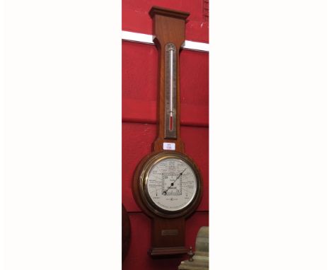 Mid-20th century mahogany cased aneroid wheel barometer, Short &amp; Mason - London, "Stormoguide", case with overhanging cor