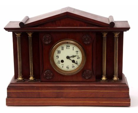 Early 20th century brass mounted mahogany mantel clock, the architectural case with Palladian pediment over four free standin