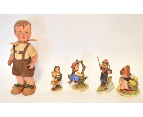 Group of Hummel figures, some with titles including Apple Tree Girl, Chick Girl and The Skier, together with a Hummel doll mo