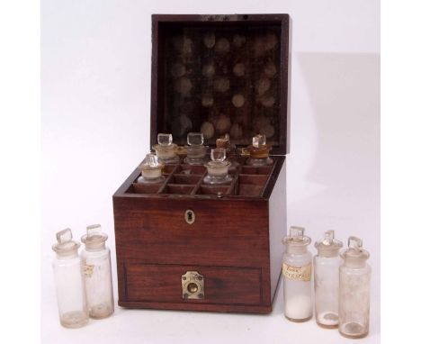 Early 19th century mahogany apothecary's cabinet of square form, the hinged cover with carry handle to a compartmentalised in