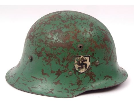 Austrian M 1916/1917 steel helmet with painted green finish and applied decal, fitted with a stitched leather liner and chin 