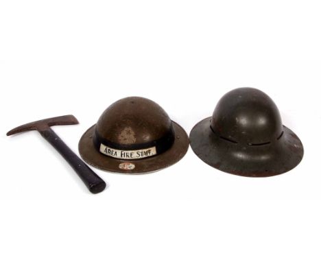 Mixed Lot: two various British steel fire helmets, the first dated 1939 with later decals and a further plain helmet stamped 