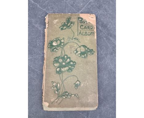 POSTCARD ALBUM: vintage album of approx 120 postcards, mixed topography and greetings, some interesting RP types noted, green