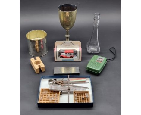 SHIPPAM'S OF CHICHESTER:&nbsp;a shelf of misc. items related, to include a green plastic transistor radio: printing block bea