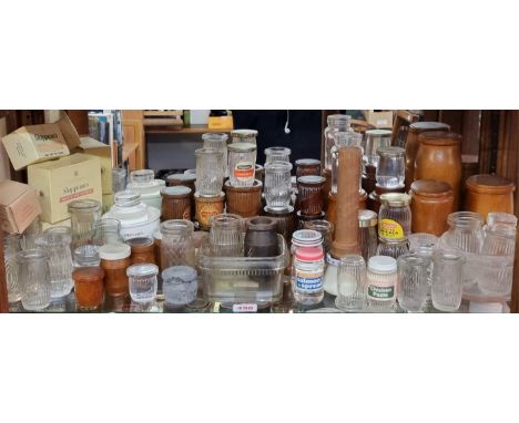 SHIPPAM'S OF CHICHESTER:&nbsp;a shelf of Shippam's pots and packaging, including manufacturer's dummies in glass, wood and me
