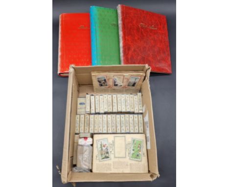 CIGARETTE CARDS/PACKAGING:&nbsp;three albums containing vintage cigarette packaging: together with a collection of cigarette 