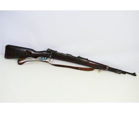 A deactivated (to the latest standard) K98 WW2 German bolt action rifle serial number 7771. The chamber is marked dot 1943. T