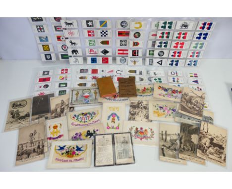 Lot to include military related cigarette cards, a quantity of World War One (WW1 / WWI) postcards / silk cards with one date