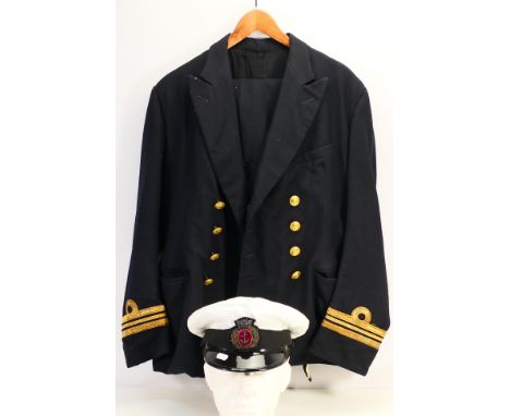 A Royal Navy uniform bearing Lieutenant Commander insignia comprising trousers, jacket and cap. [W]