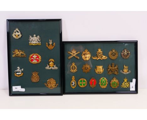 Two framed displays of cap badges to include Machine Gun Corps, Tank Corps, Royal Artillery, Royal Engineers, Royal Flying Co
