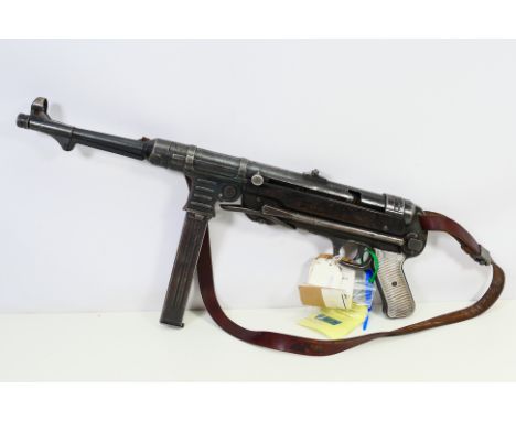 A deactivated (to the latest standard) MP40 machine pistol serial number 1779. This iconic German machine gun from WW2 is a m