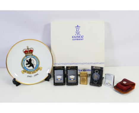 Zippo - Four Zippo lighters and a keyring, three bear Cheshire Yeomanry badge, one a Falklands War commemorative, one lighter