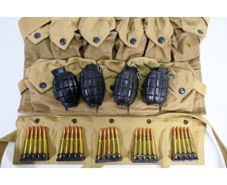 A United States military eleven pouch grenade bandolier, stamped to the back Earl & Wilson, May 1918, containing four dummy /