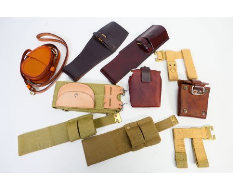 Reenactment - A collection of leather and webbing military items to include compass case, ammunition pouches and other. [W]
