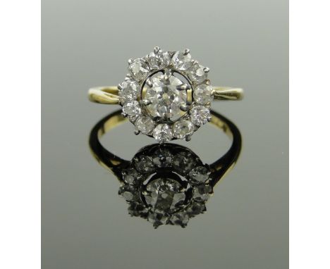 18ct gold diamond cluster ring,
setting height 11mm, size N.