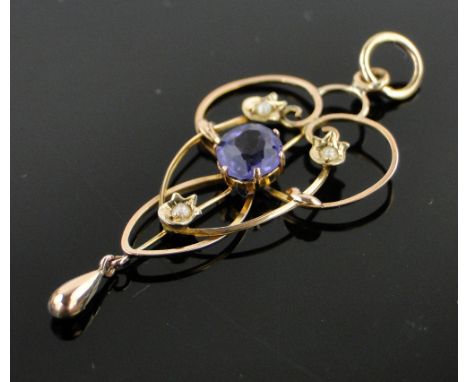 A 9ct gold amethyst and seed pearl set open work pendant,
height 40mm.
