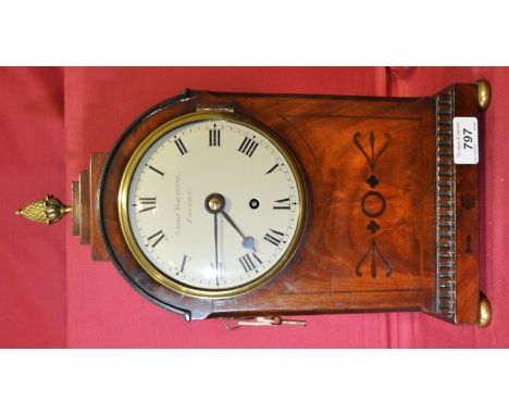 19th century mahogany arched top mantel clock,
having a single fusee movement, dial marked James Haughton, London, height 15"