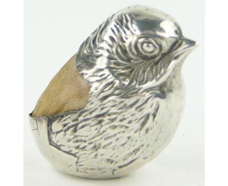 An Edwardian silver chick design pin cushion,
by S Mordan & Co., Chester 1910, height 32mm.
