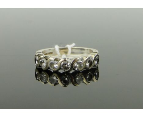 18ct white gold 7 stone diamond half eternity ring,
total diamond content over 1ct, size N.