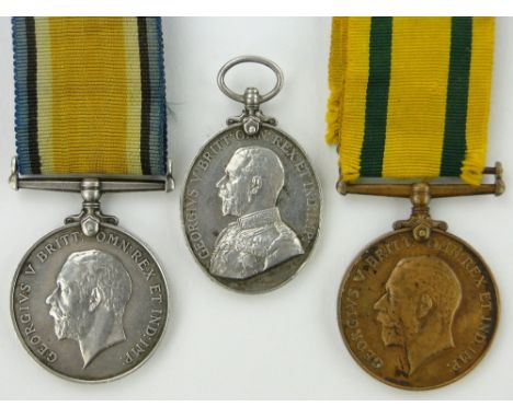 3 First World War medals 
to Sergeant W R Martin, 110 RA and a Territorial Army medal, (3).