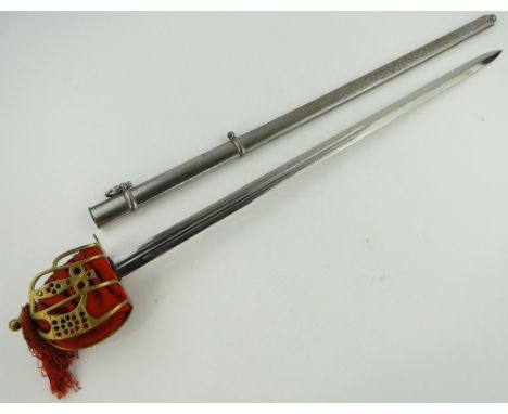 Reproduction Scottish brass and steel basket hilted sword,
with steel scabbard, overall length 40".