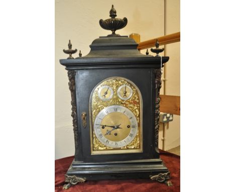 An impressive Victorian ebonised bracket clock,
having a 3-train fusee movement on 8 bells striking on a gong, case decorated