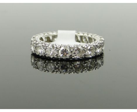 A diamond eternity ring,
over 1.5cts total, band width 4mm, size M.