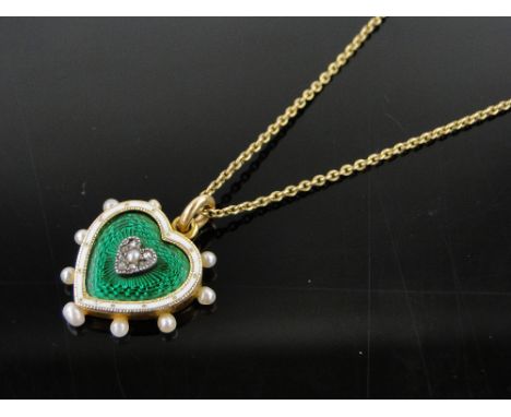 A pearl enamel and diamond heart shaped pendant,
unmarked gold settings on gold chain, pendant height 20mm.