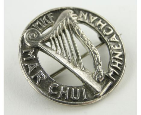 An Iona silver harp design brooch,
hallmarks Birmingham 1931, 29mm across.