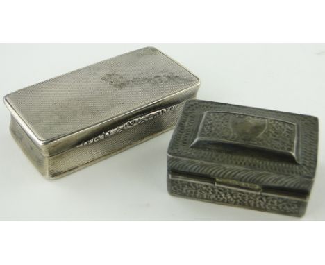 An engine turned silver snuff box,
Birmingham 1936, 8.5cm and a smaller continental silver snuff box, unmarked, (2).