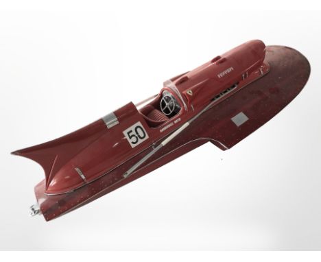 A scale model Ferrari boat, length 92cm.