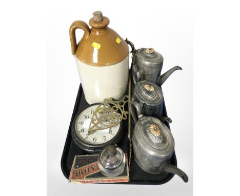 A 19th-century stone ware flagon, pewter tea wares, a circular wall timepiece, brass trivet, Rolls razor in box, a glass inkw