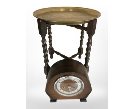 An oriental brass-topped barley-twist occasional table, height 45cm, and an Art Deco oak mantel clock.