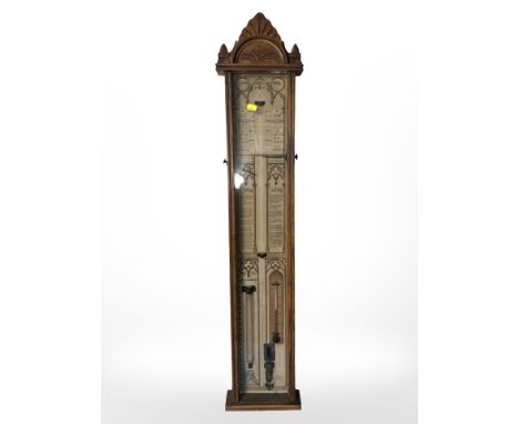 A Victorian carved oak Admiral Fitzroy's barometer, length 107cm.