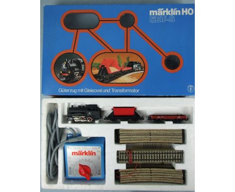 Märklin HO Set-S, 2930, with a DB 0-6-0T tank engine, two wagons, tinplate track and transformer, boxed with instructions.