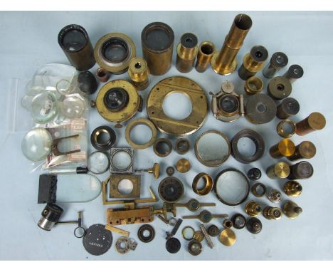 A quantity of mainly brass-mounted microscope and camera lenses and microscope parts, including a Dallmeyer 12" F7.7 Dallon T