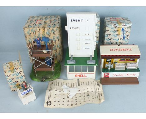Scalextric trackside accessories: A228 Refreshment Kiosk, F302 TV Camera and Crew Set, A201 Event Board and Hut and F303 Star