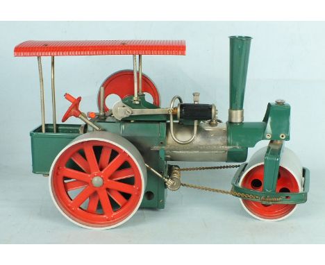 A Wilesco D36 "Old Smokey" steam roller with burner.