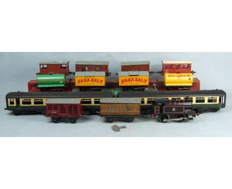 Hornby O Gauge, a Type-40 BR black 0-4-0 tank engine no.82011, nine boxed wagons, including two no.50 'Saxa' salt wagons, an 