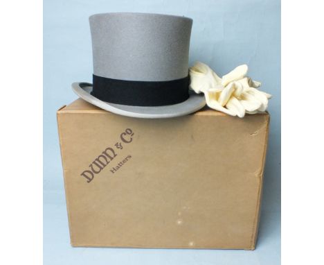 A group of eleven gent's hats, to include a Gieves Ltd pith helmet, a Dunn & Co. grey top hat, two bowler hats, a Royal Navy 