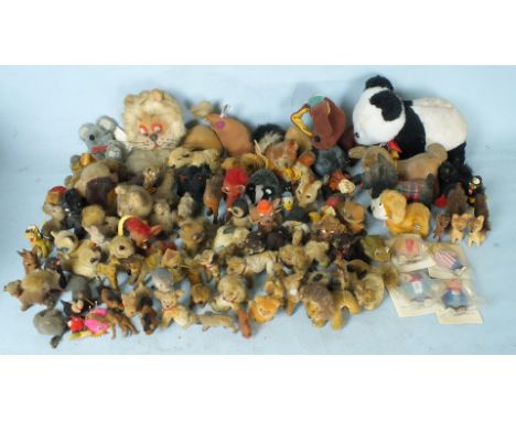 A collection of seventeen Original Toys (West Germany) and other real-fur animal toys, a Schuco lion, a Japanese c/w plush co