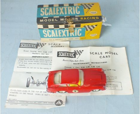 Scalextric, a C68 Aston Martin DB4 GT without lights, red with cream interior, RN7, in original box with instructions (af , 2