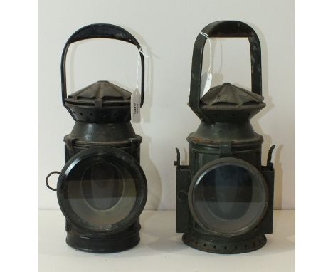An E K Bowman triple aspect railway lamp dated 1940, 32cm high, and another similar lamp, (2).